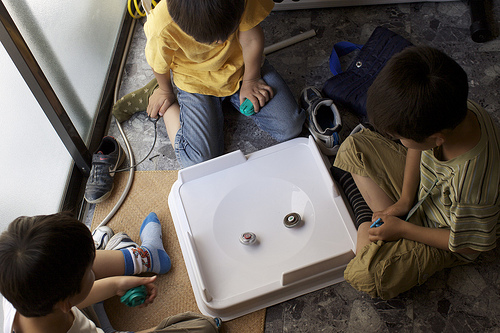 Kids Playing Beyblade